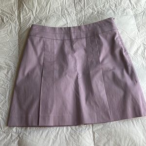 Fully lined lavender skirt with center pleat. Very good contain, non-smoker.